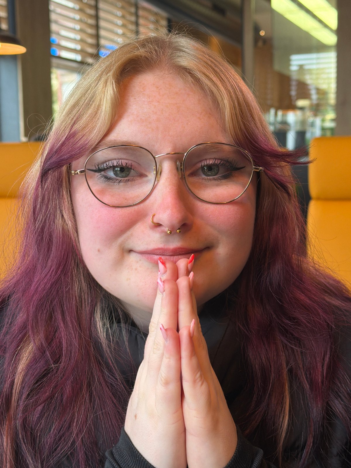 Young women share casual restaurant moment in Grevenmacher