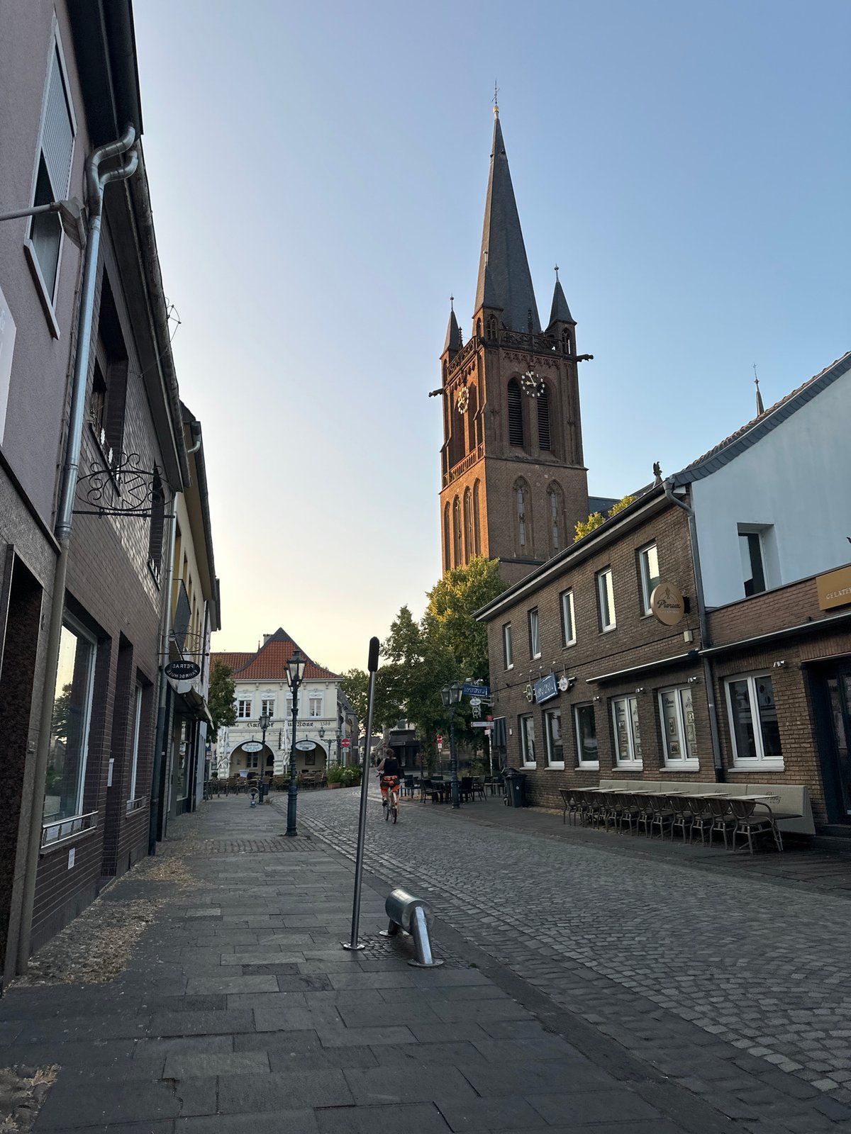Cobblestones, church spires, and petunias in Krefeld
