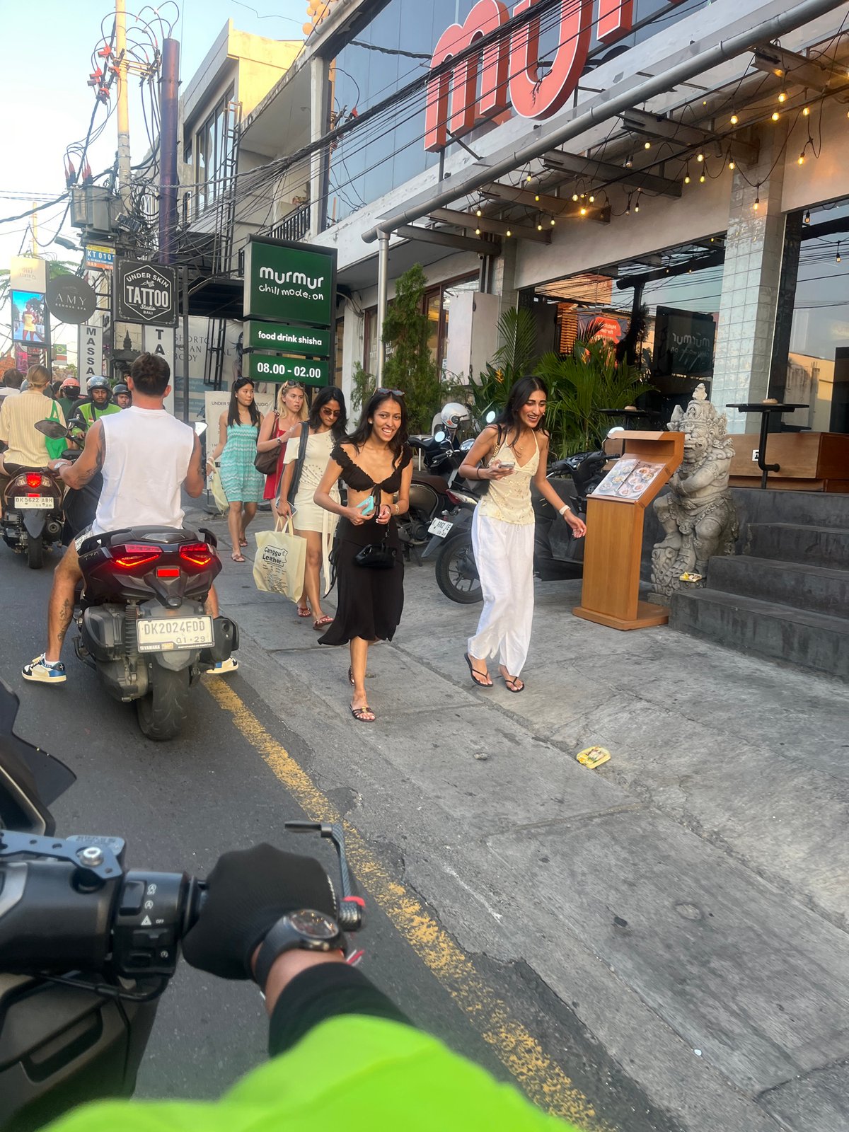 Morning traffic and street life through North Kuta, Bali