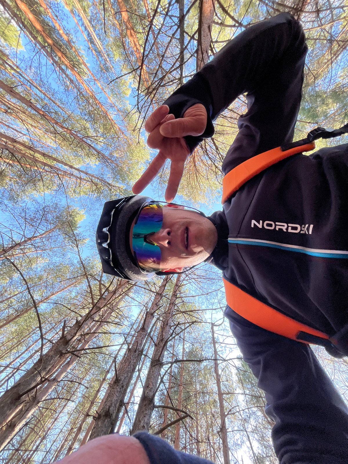 Cyclist flashes peace sign in Chaikovsky, Russia