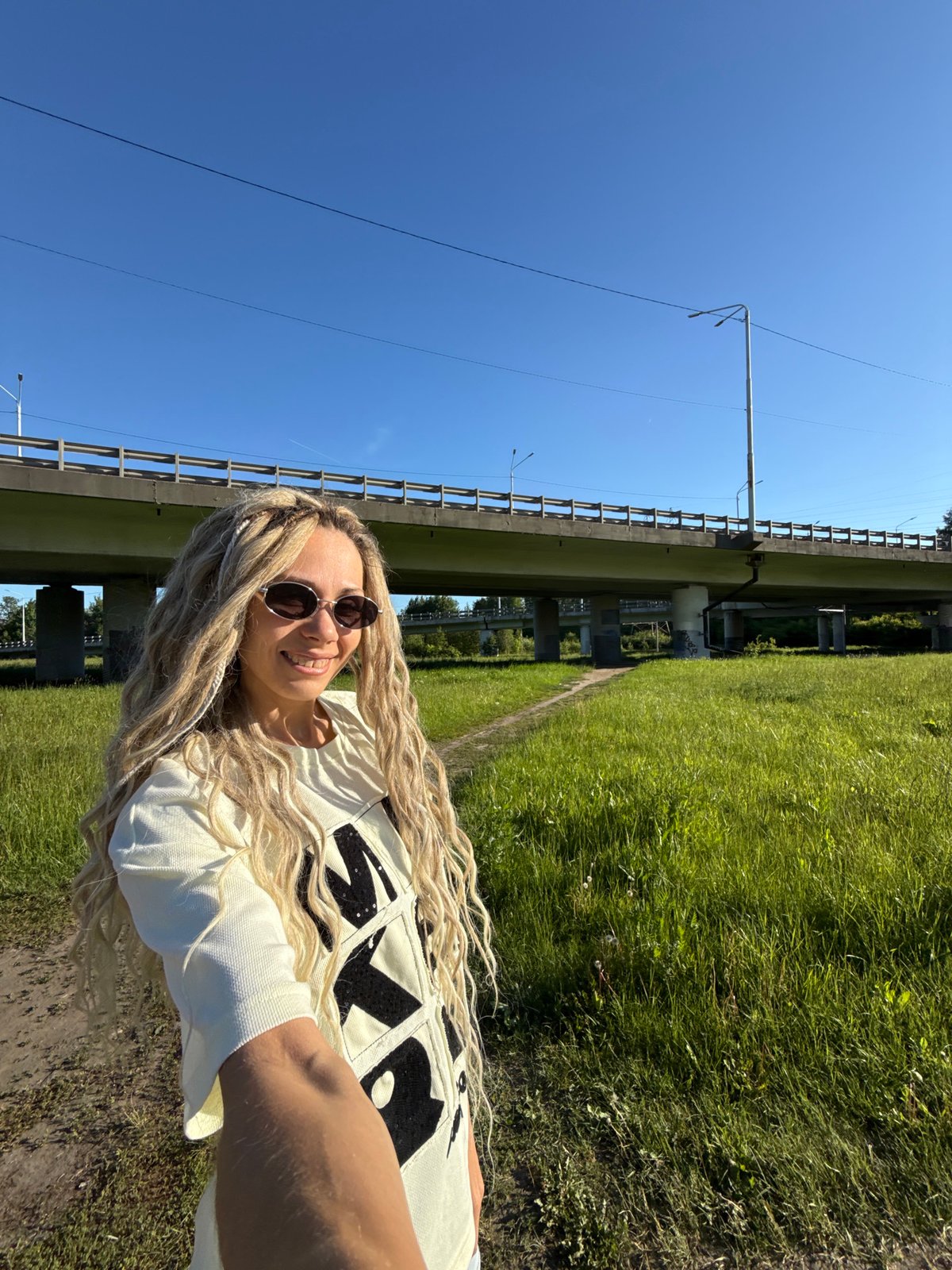Woman takes outdoor selfie in Шебунино, Russia