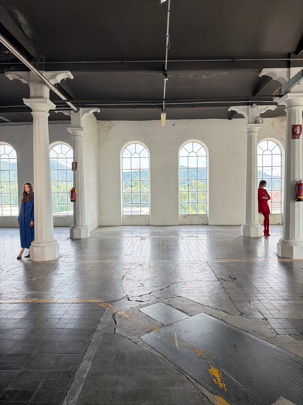 Professional photoshoot documented in converted warehouse, Alzano Lombardo