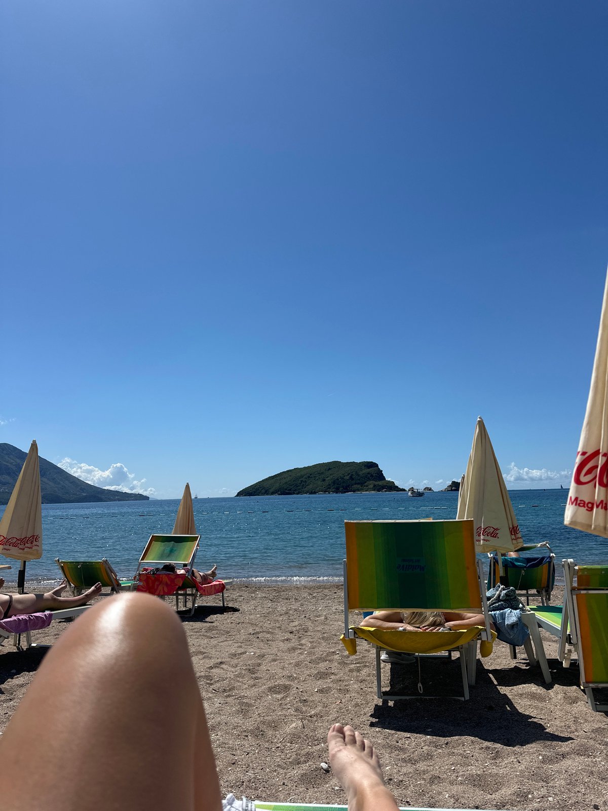 Morning beach relaxation captured in Budva, Montenegro