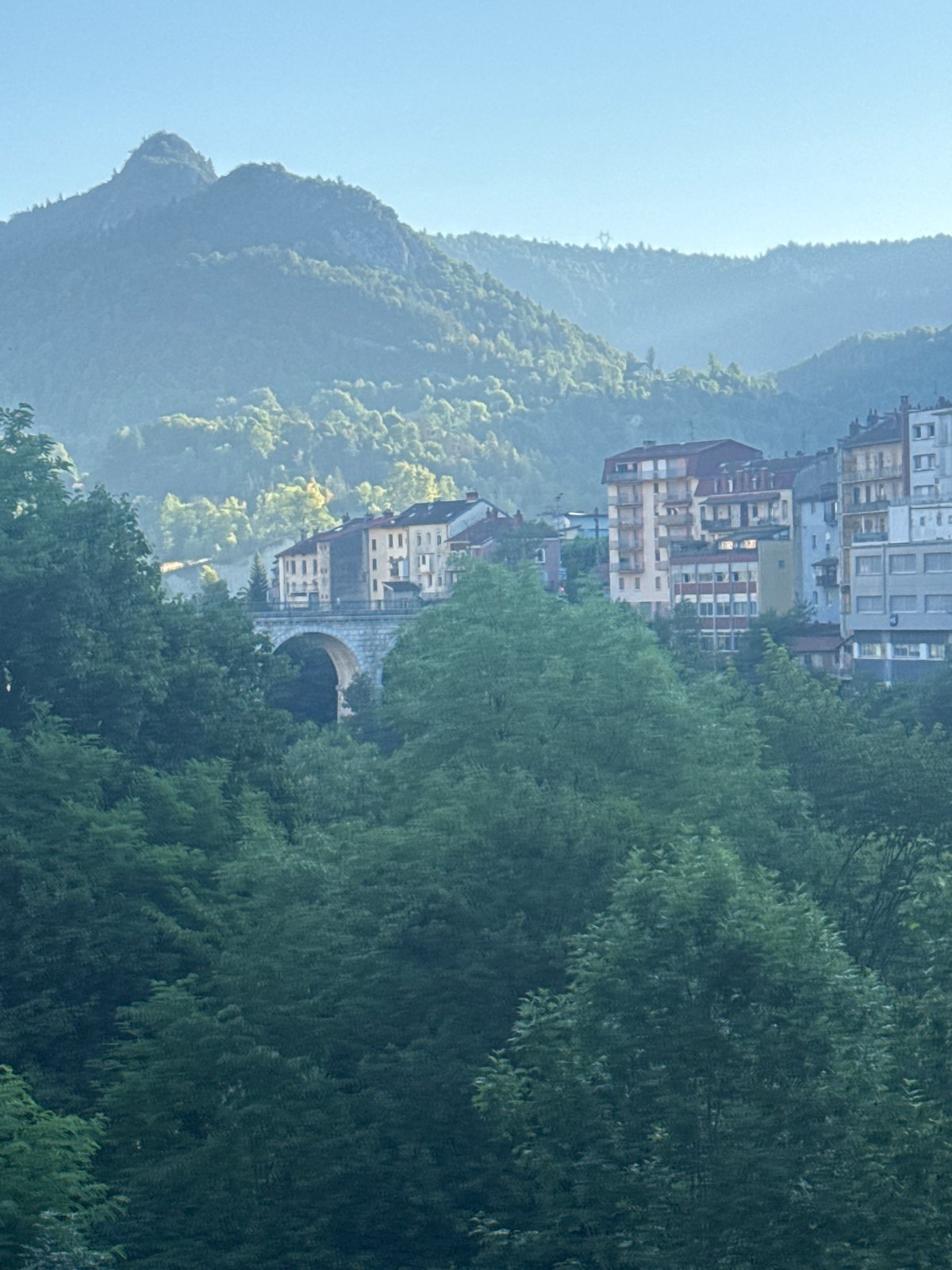 Morning views over Saint-Claude's valley from a scenic overlook