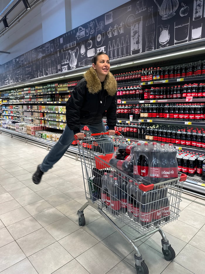 Shoppers browse supermarket aisles in Sochi during afternoon outing