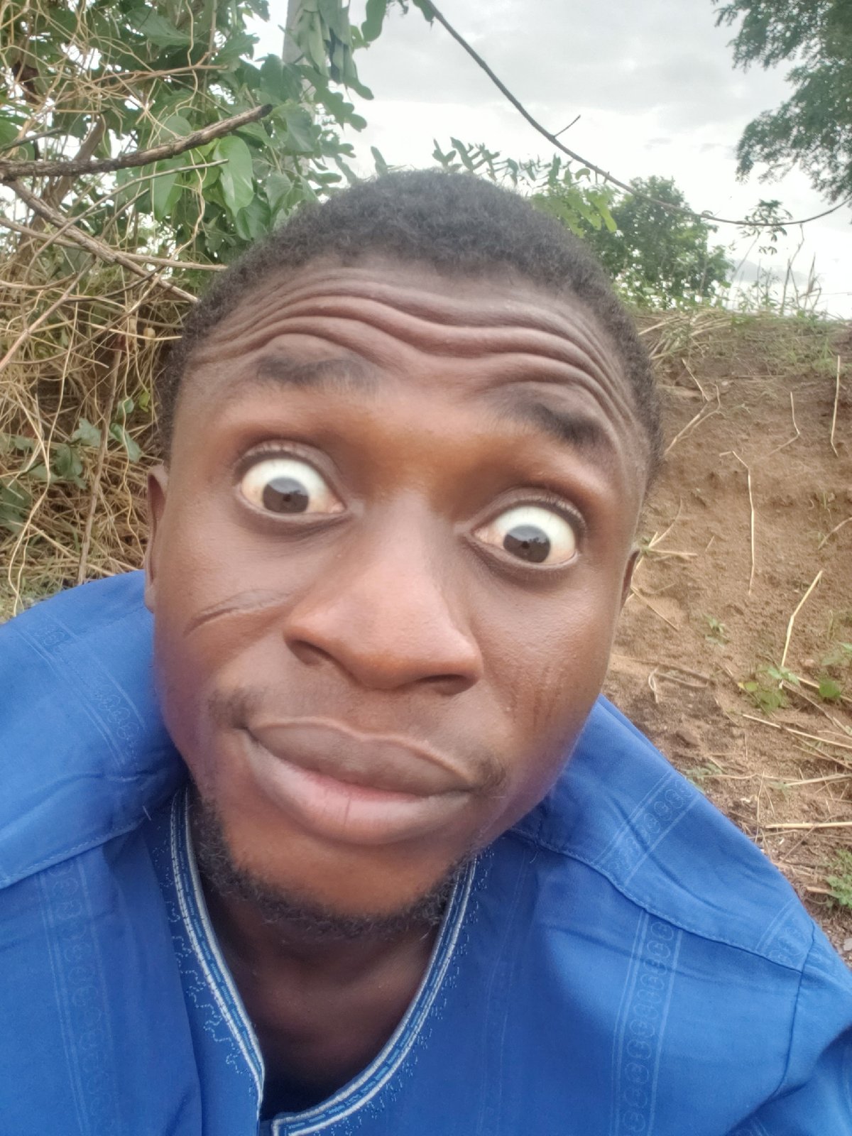 Man documents personal moments in Adankolo hillside community