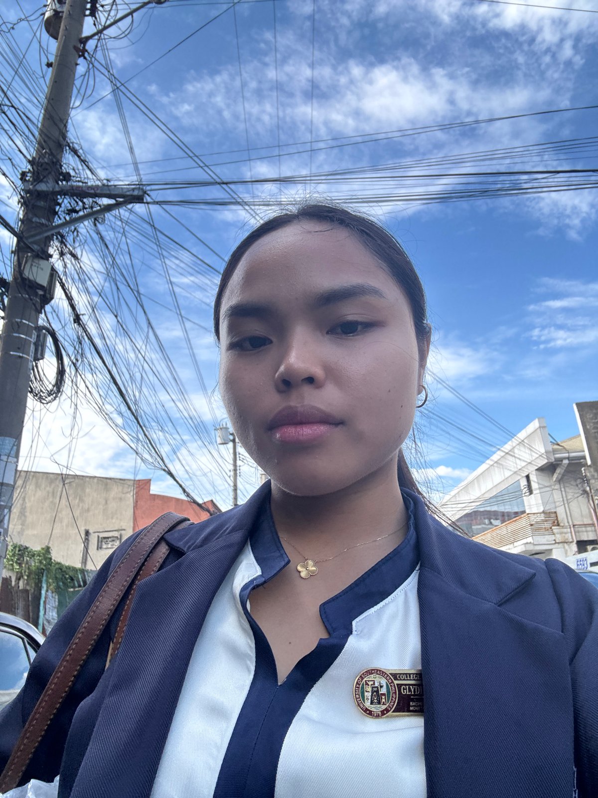 Navy blazer, urban Davao — two angles, seconds apart