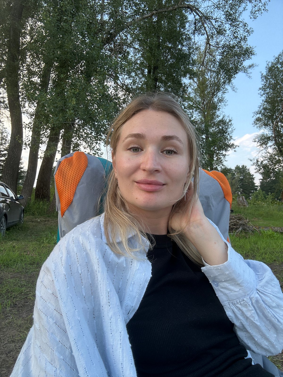 Riverside camping in rural Russia on a sunny afternoon