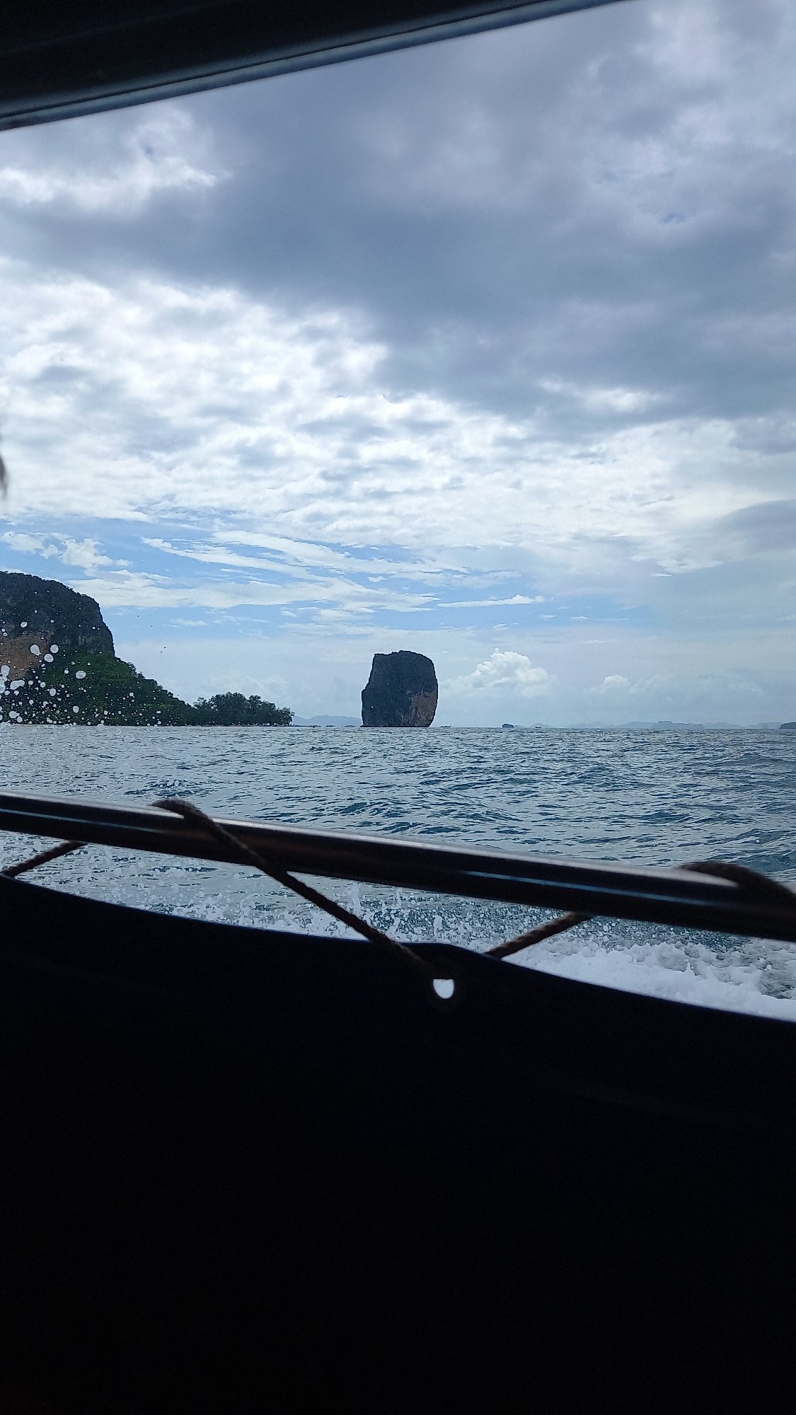 Boat journey captured in choppy waters off Ao Nang
