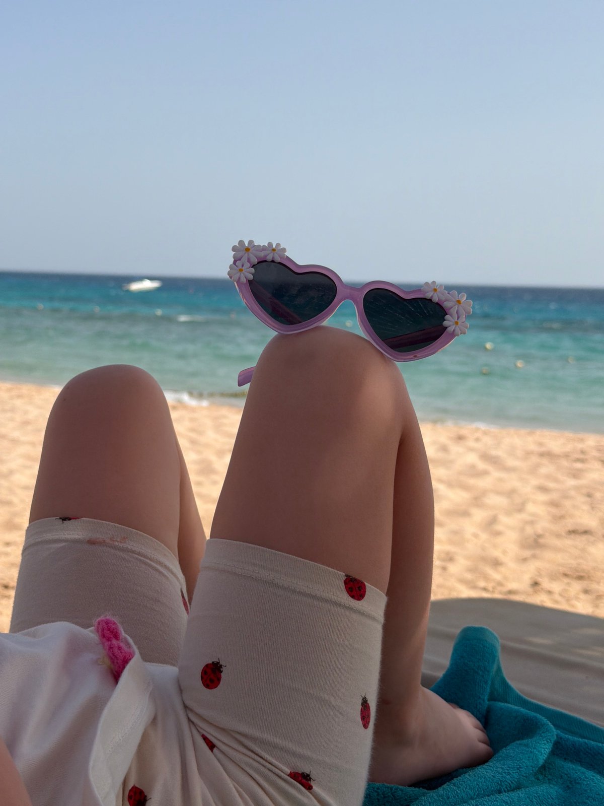 Beach visitor enjoys quiet afternoon at Sharm El Sheikh resort