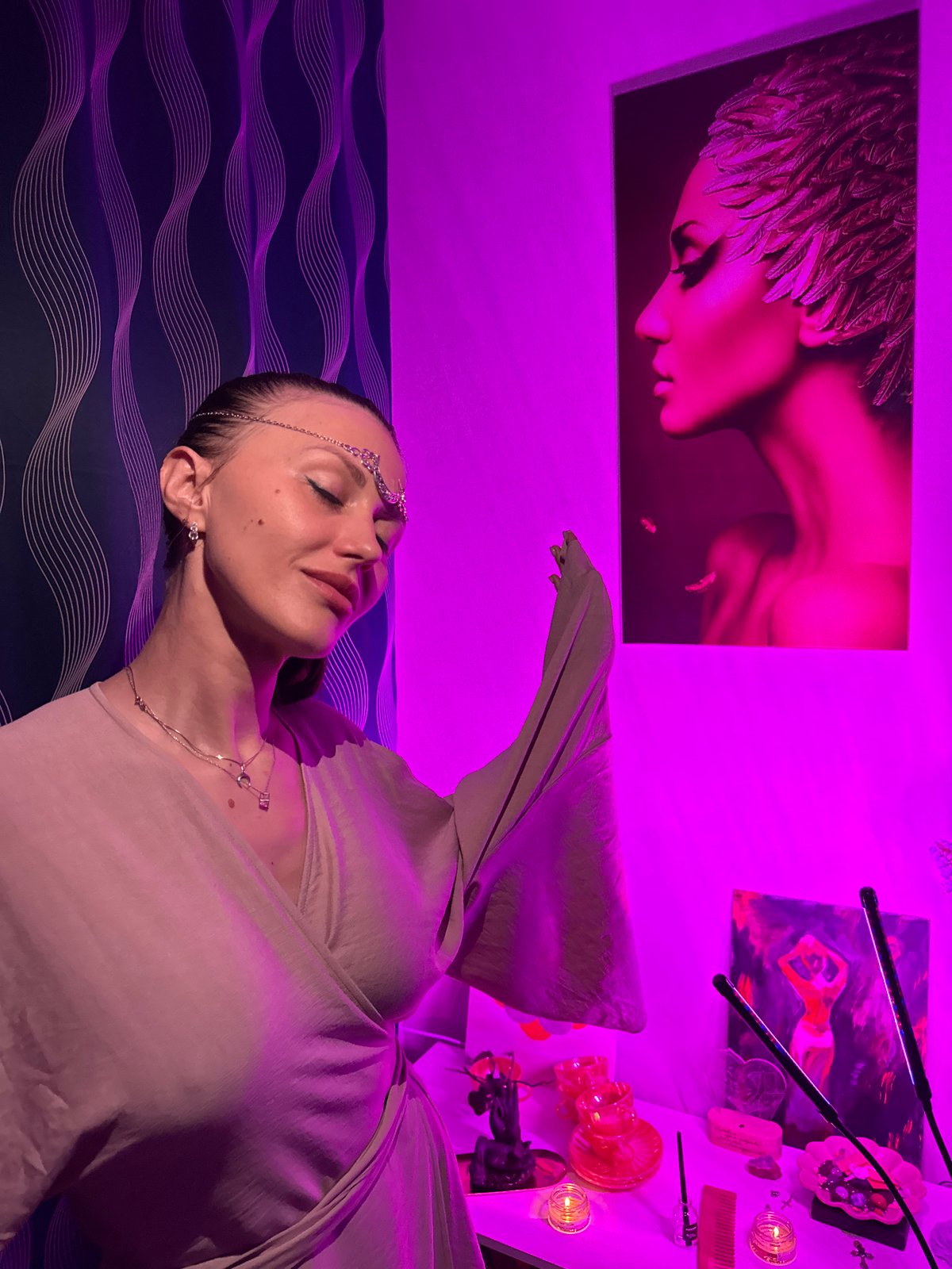 Woman photographed in bedroom and kitchen during evening hours
