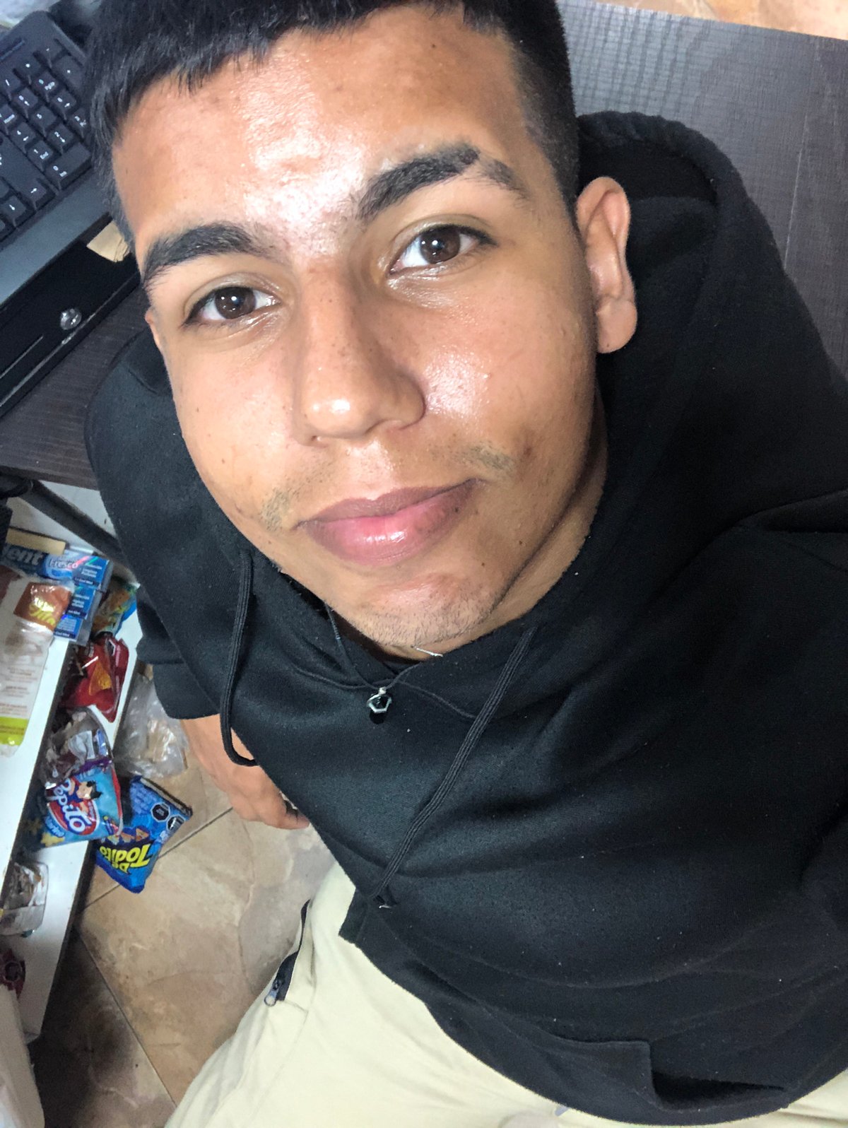 Young man photographed indoors in Juan Griego, Venezuela