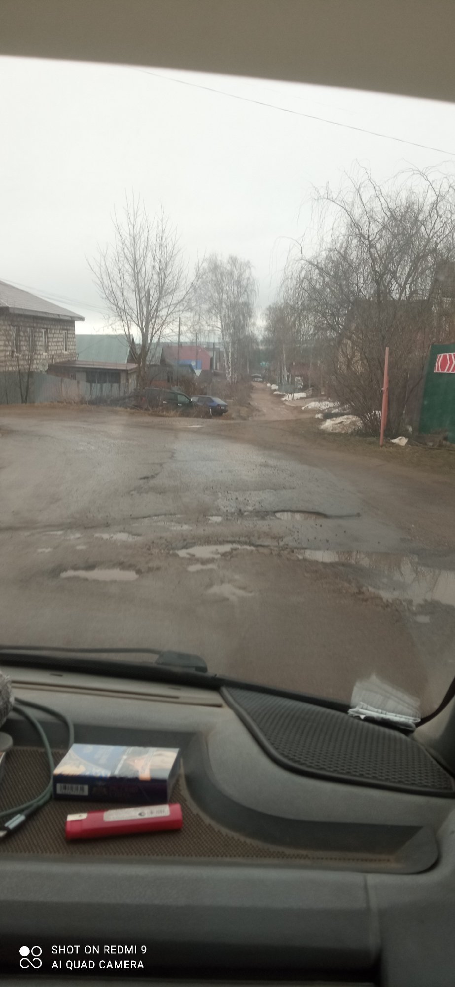 Vehicle occupant observes residential street, location unknown