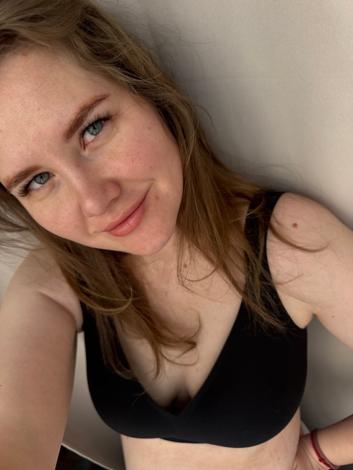Woman captures self-portraits in bedroom in Gornyi, Russia