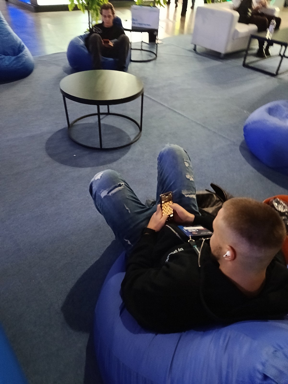 Casual moments captured in Khimki: indoor relaxation and street crossing