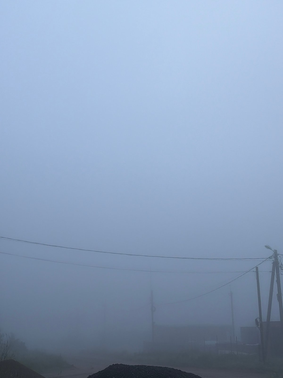 Dense fog envelops Chaikovsky, Russia in early morning hours