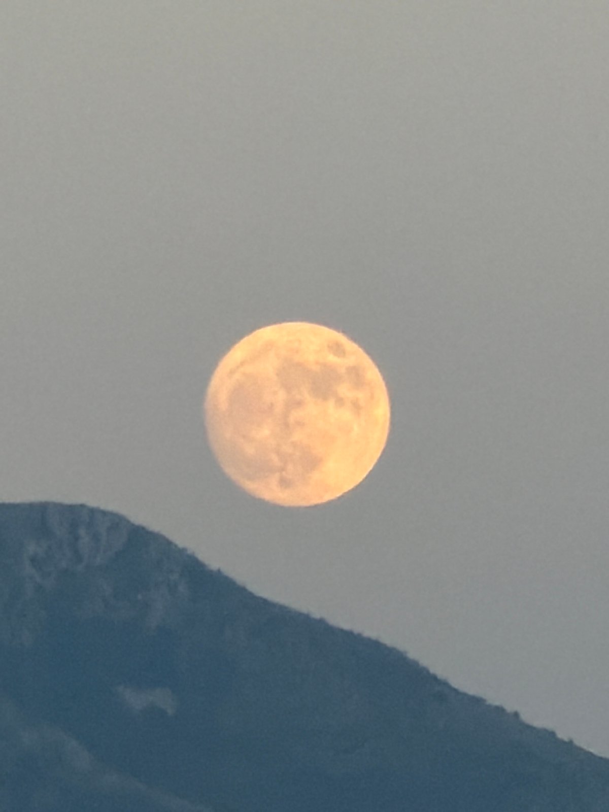 Budva at dusk: moonrise, boats, and coastal street life
