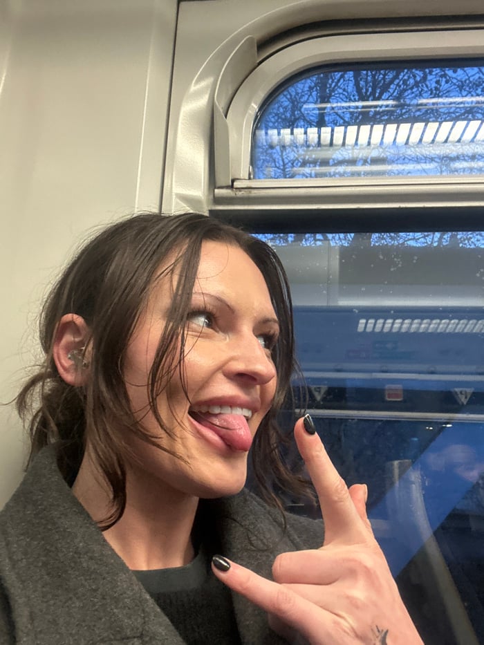 London commuter celebrates on train amid positive workplace messages