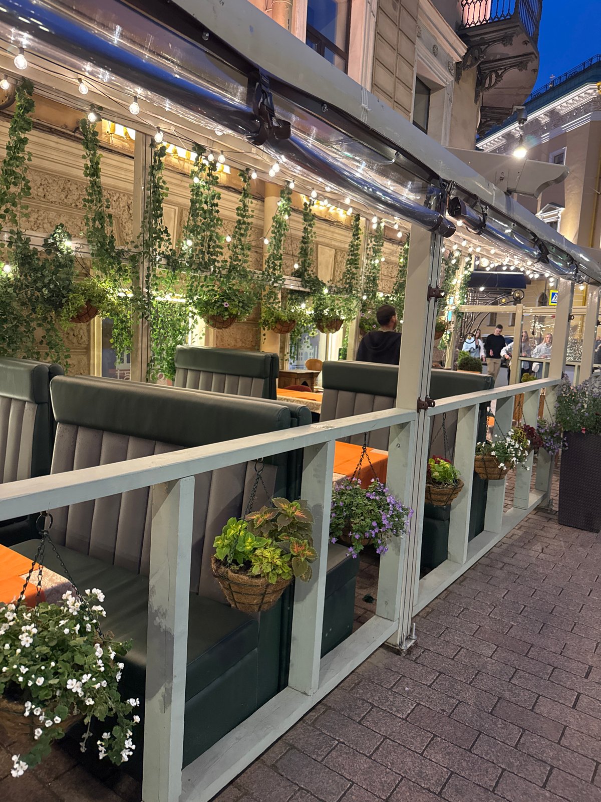 Summer evening on a Saint Petersburg outdoor dining strip
