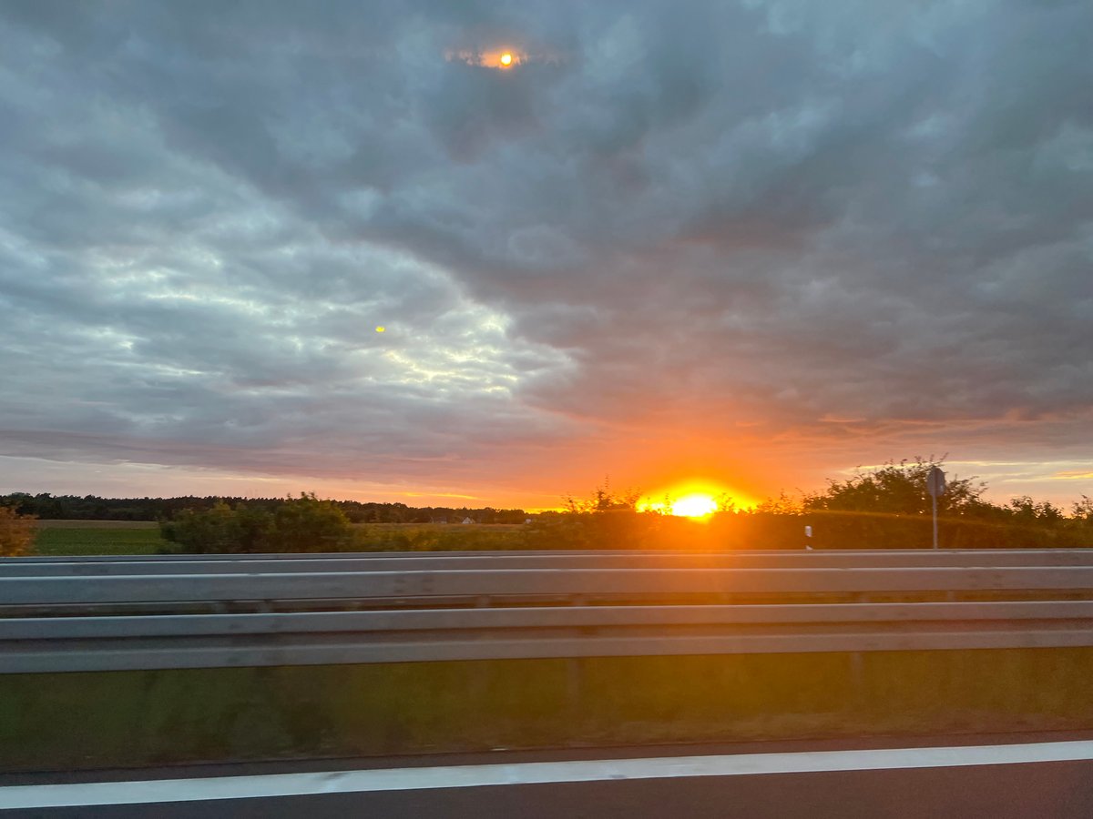 Cloudy highway sunset outside Ludwigsfelde, Germany