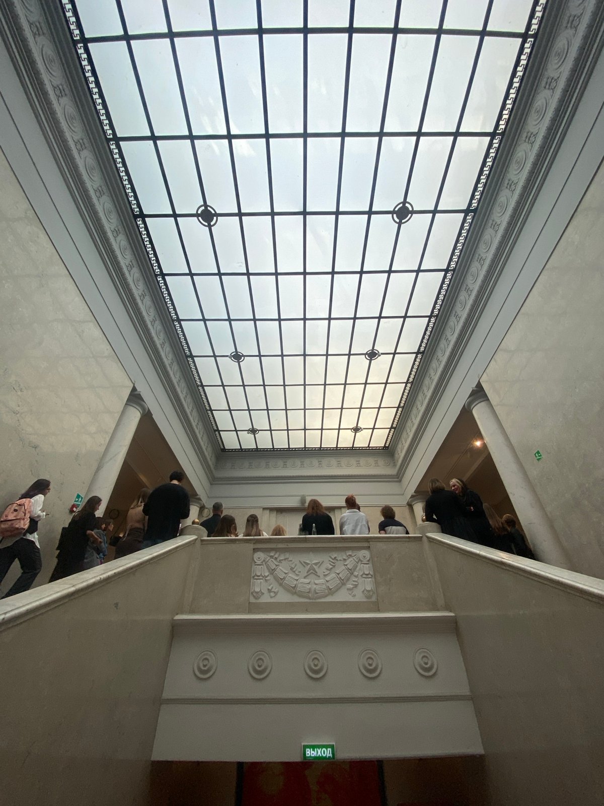 Art gallery visitors view floor installation in Moscow