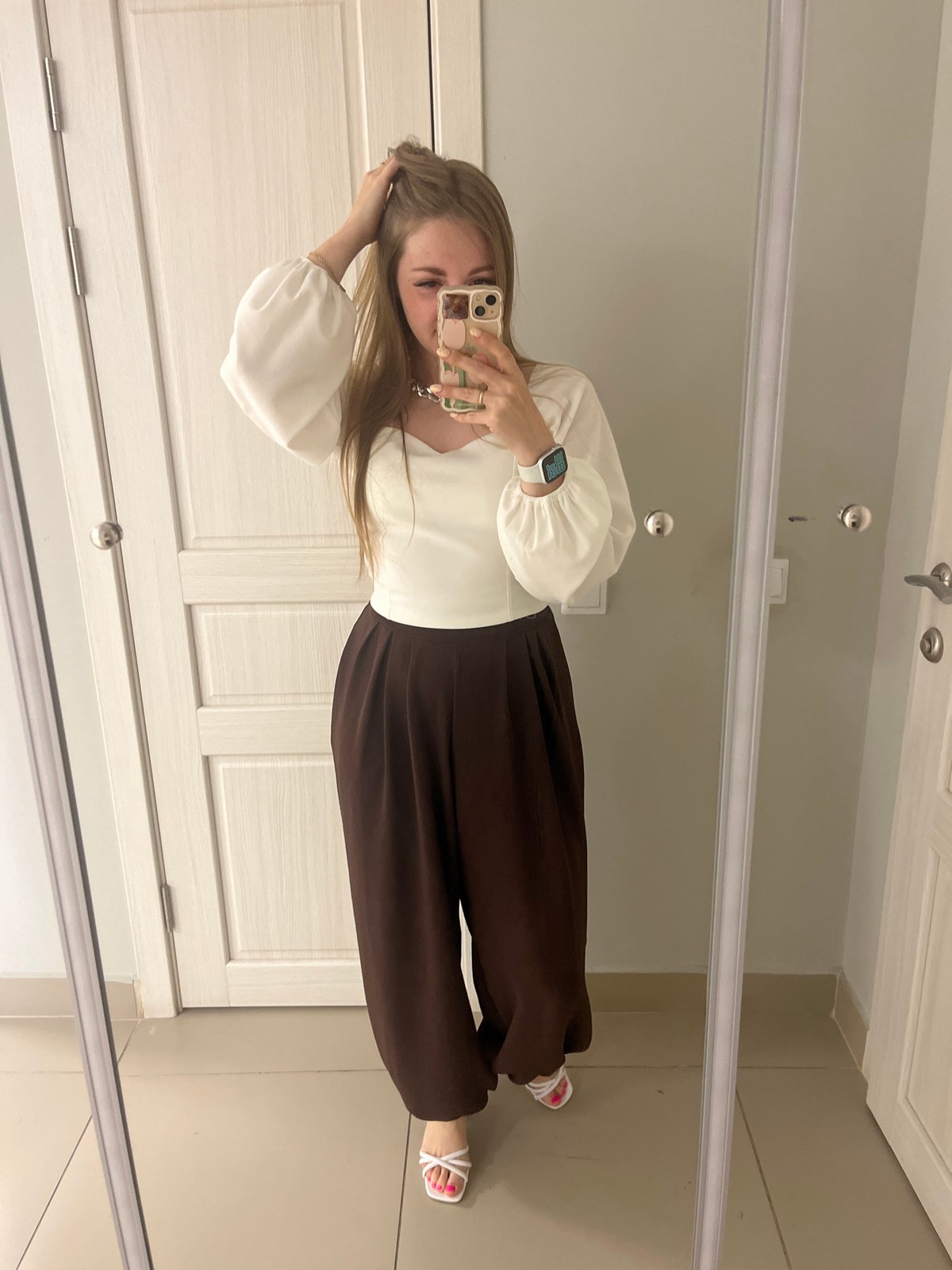 Woman takes multiple mirror selfies in Chelyabinsk buildings