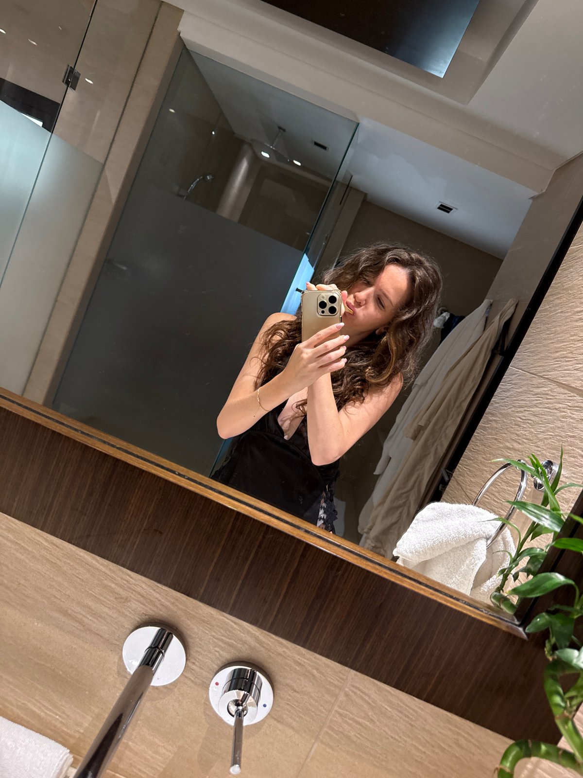 Woman takes bathroom selfies at Dubai luxury accommodation