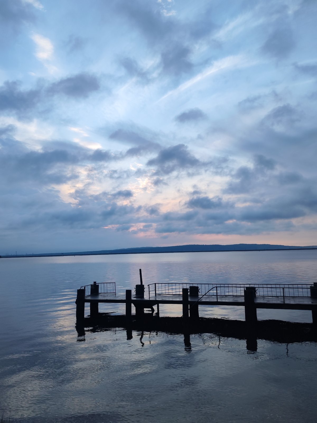 Afternoon lakeside scenes documented at Kama Reservoir in Chaikovsky