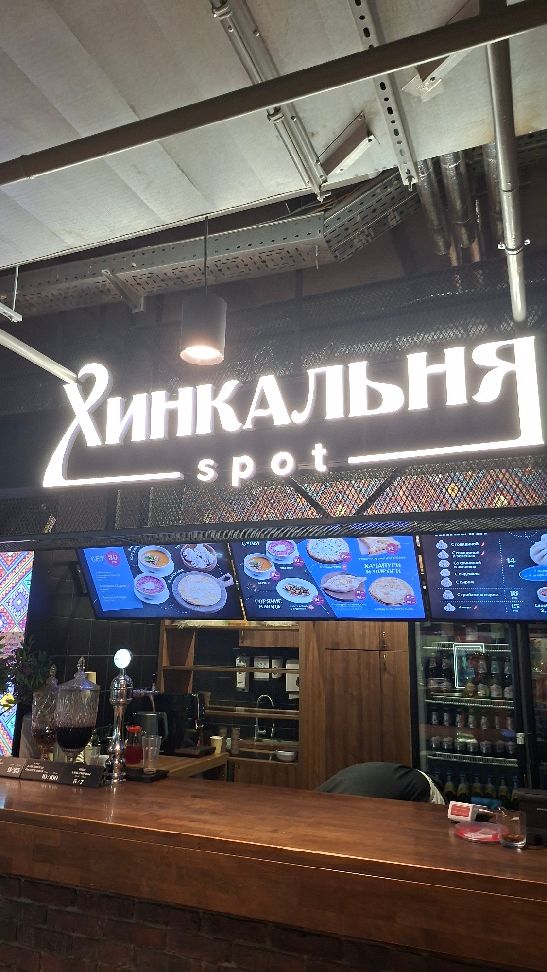 Inside Minsk's Konkurs mall: food court, shops, and street views