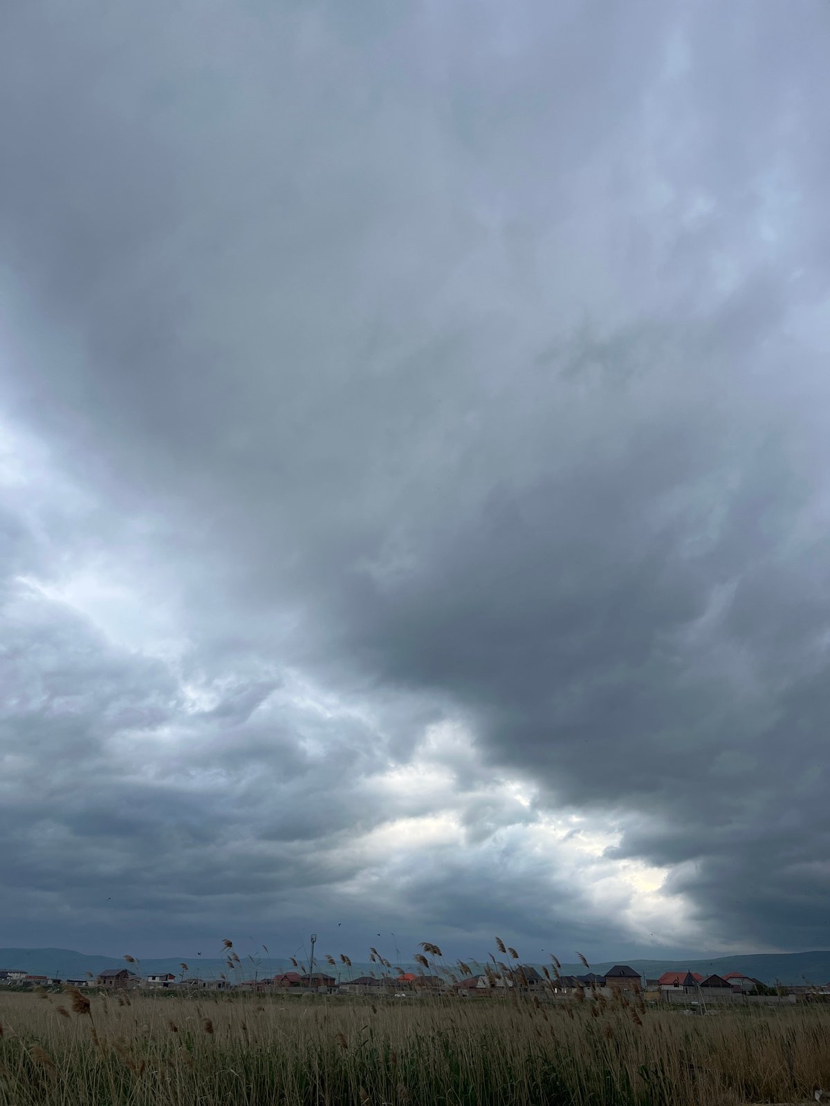 Overcast afternoon landscape documented near Kaspiysk, Russia