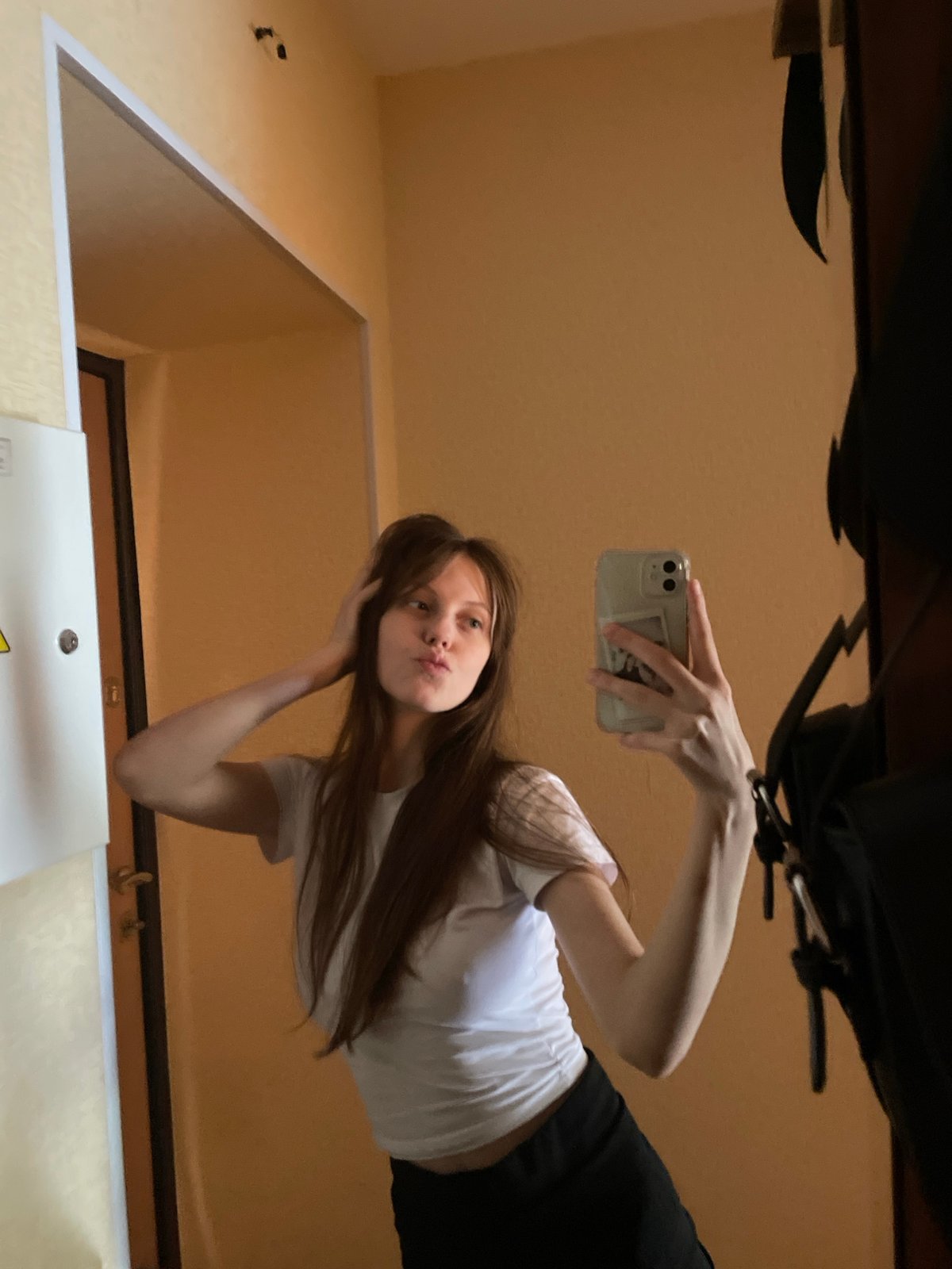 Casual bedroom and hallway selfies from a Ufa apartment