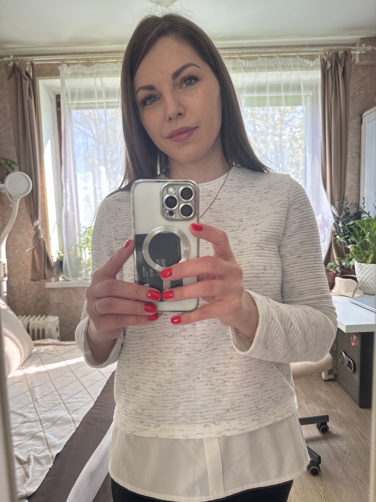 Woman documents morning routine with selfies, car travel in Russia