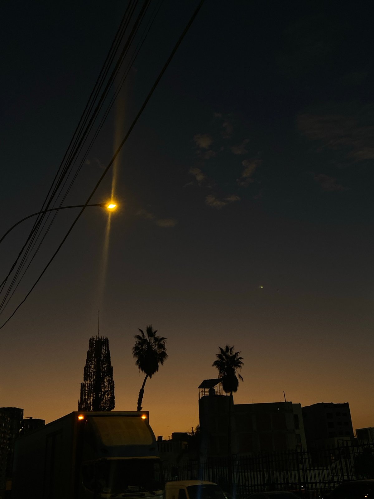 Twilight scene documented in San Miguel, Peru street