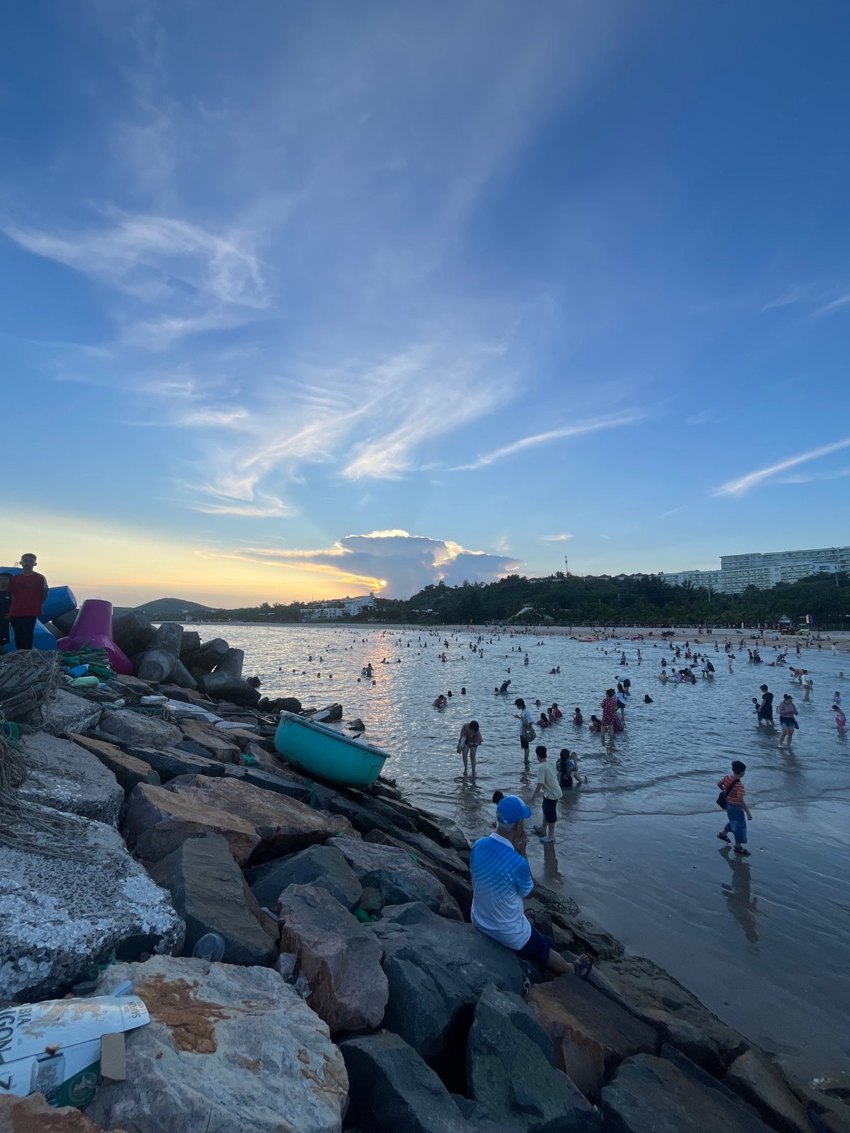 Sunset crowd at Phu Thuy Ward beach, Vietnam