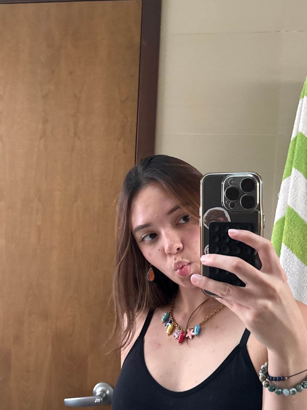 Person takes mirror selfies in San Bernardino Tlaxcalancingo, Mexico