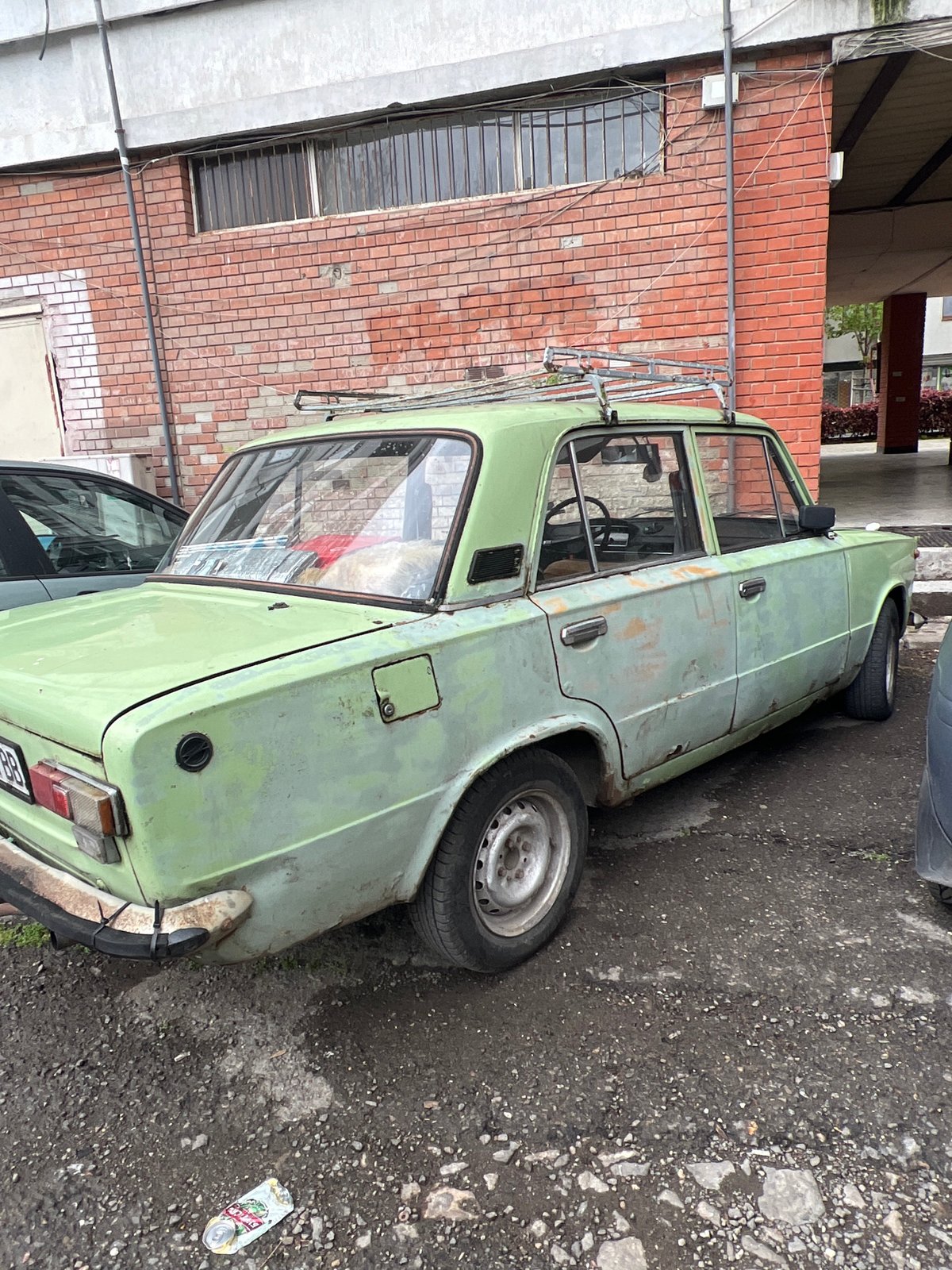 Faded green Lada sedan spotted parked in Burgas