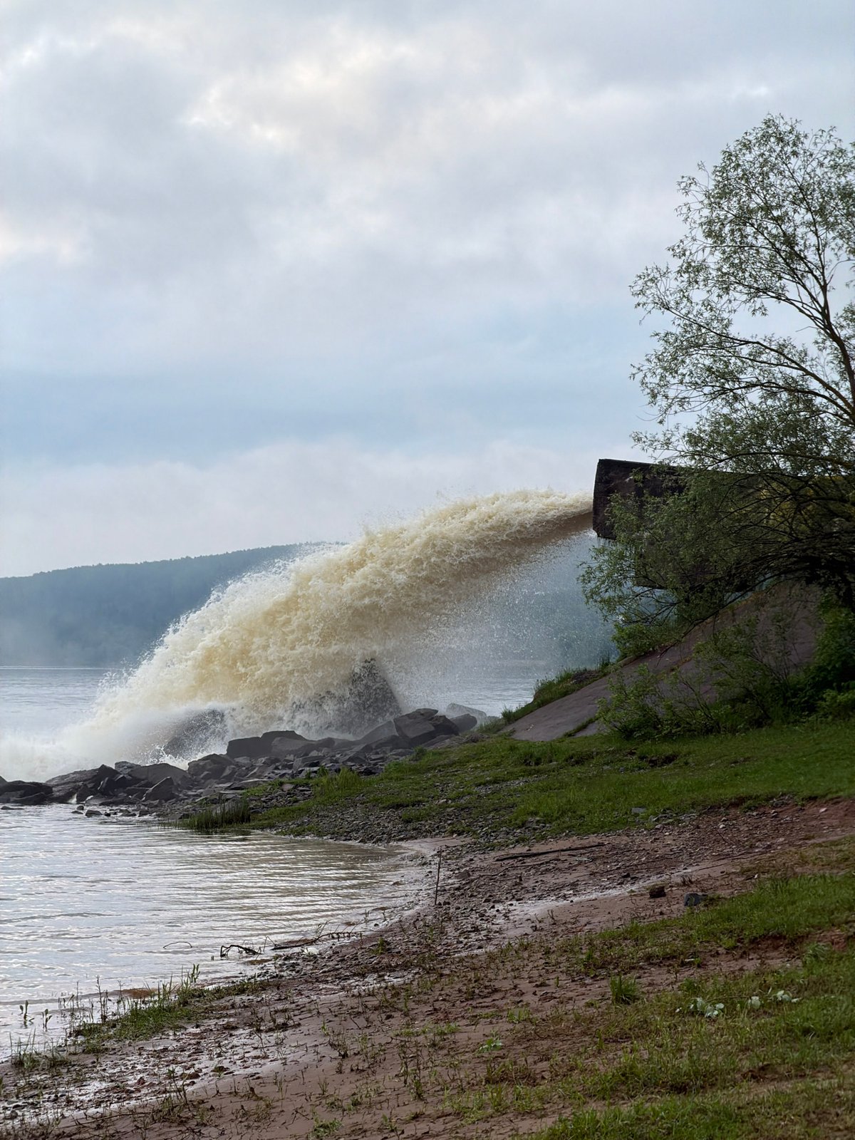 Late-night fishing near waterfall in Chernushka, Russia