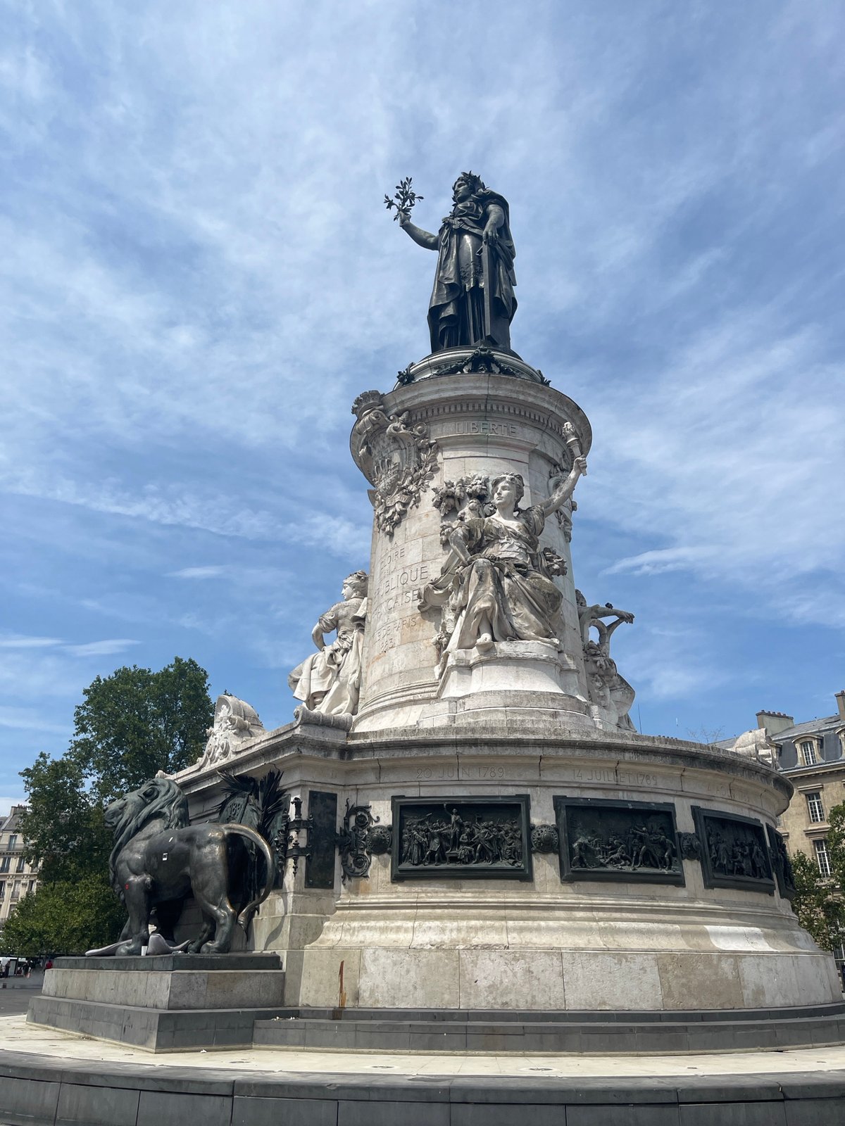 Place de la République on a summer afternoon, lions and all