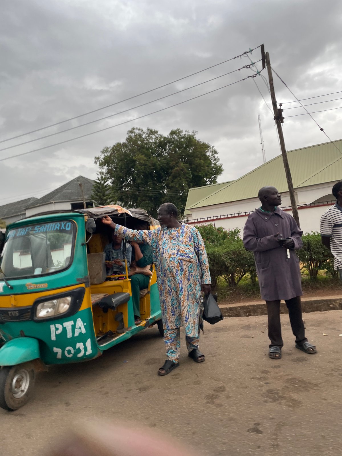 Yellow-green auto rickshaw spotted in Jos, Nigeria