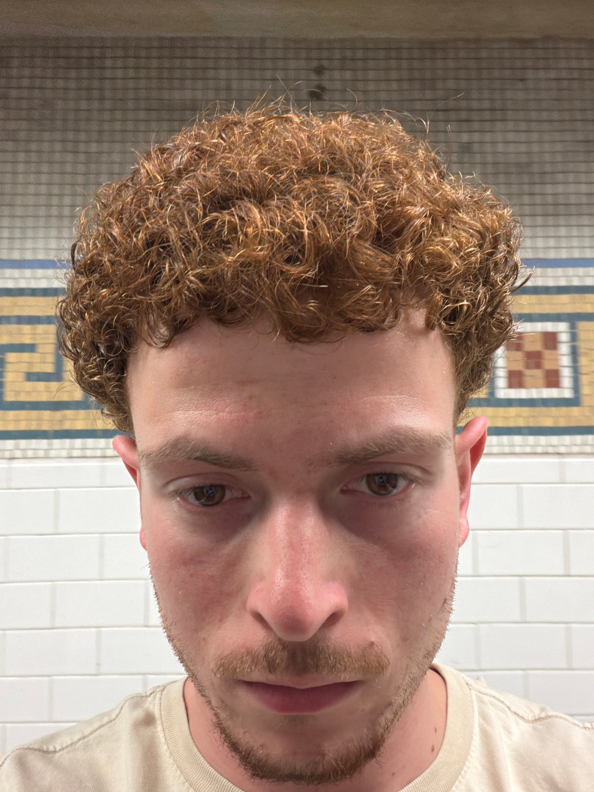 Man photographed twice in industrial NYC setting early morning