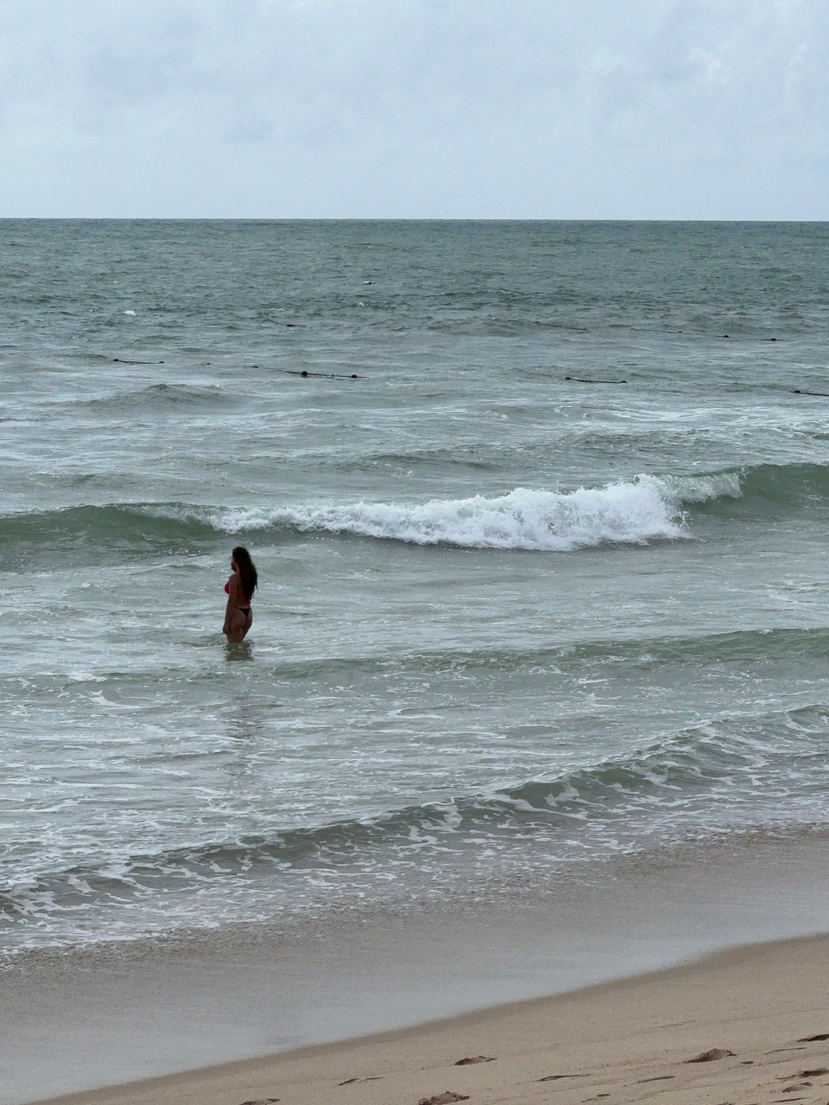 Overcast morning beach life at Choeng Thale, Phuket