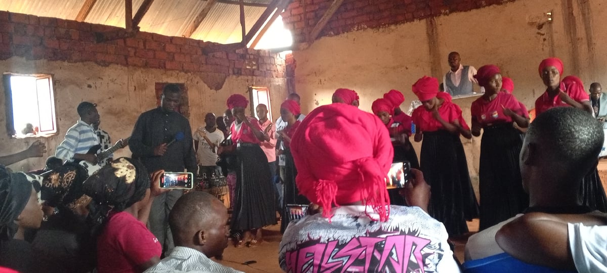 Women's choir performs in rural Congo church service