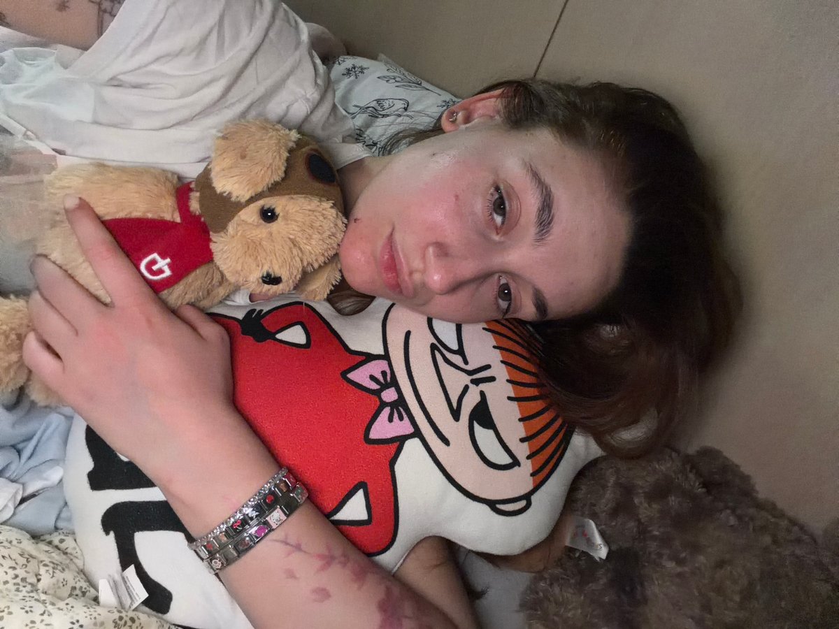 Young woman photographed resting in bed in Sofia