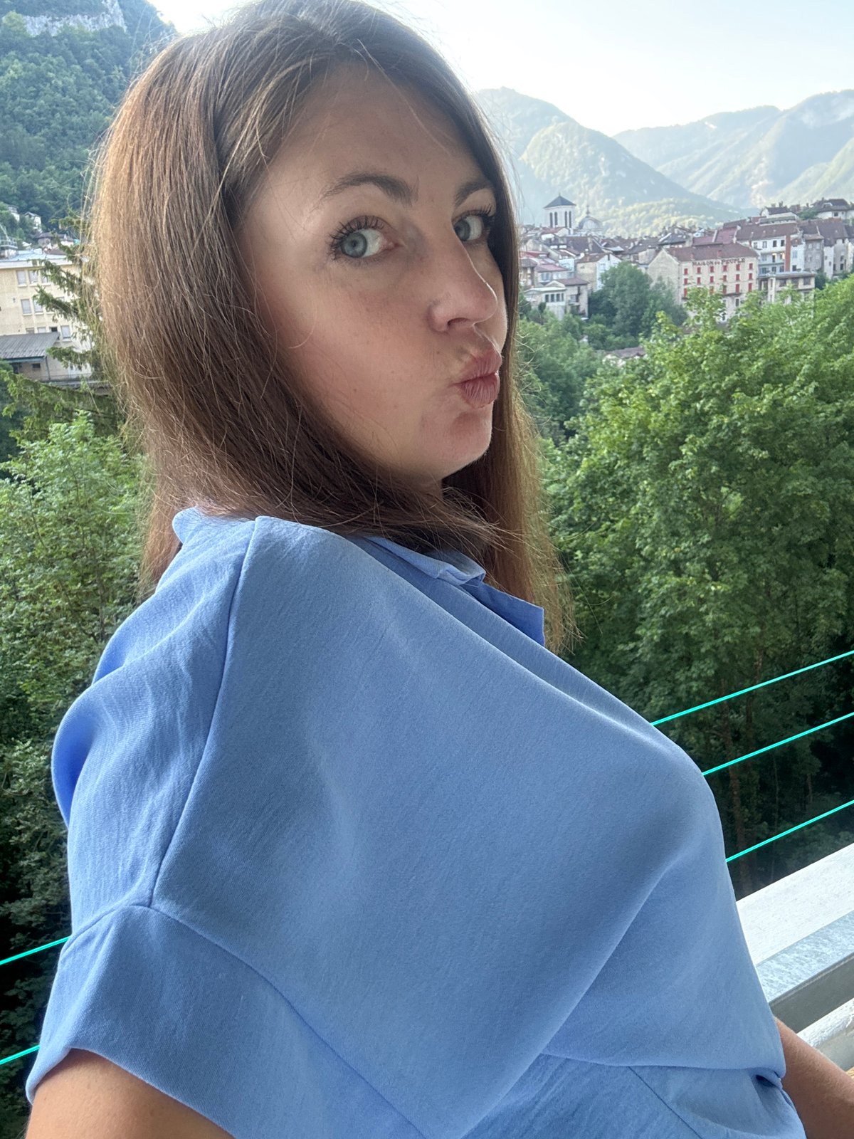 Balcony selfies and strawberry dessert in Saint-Claude
