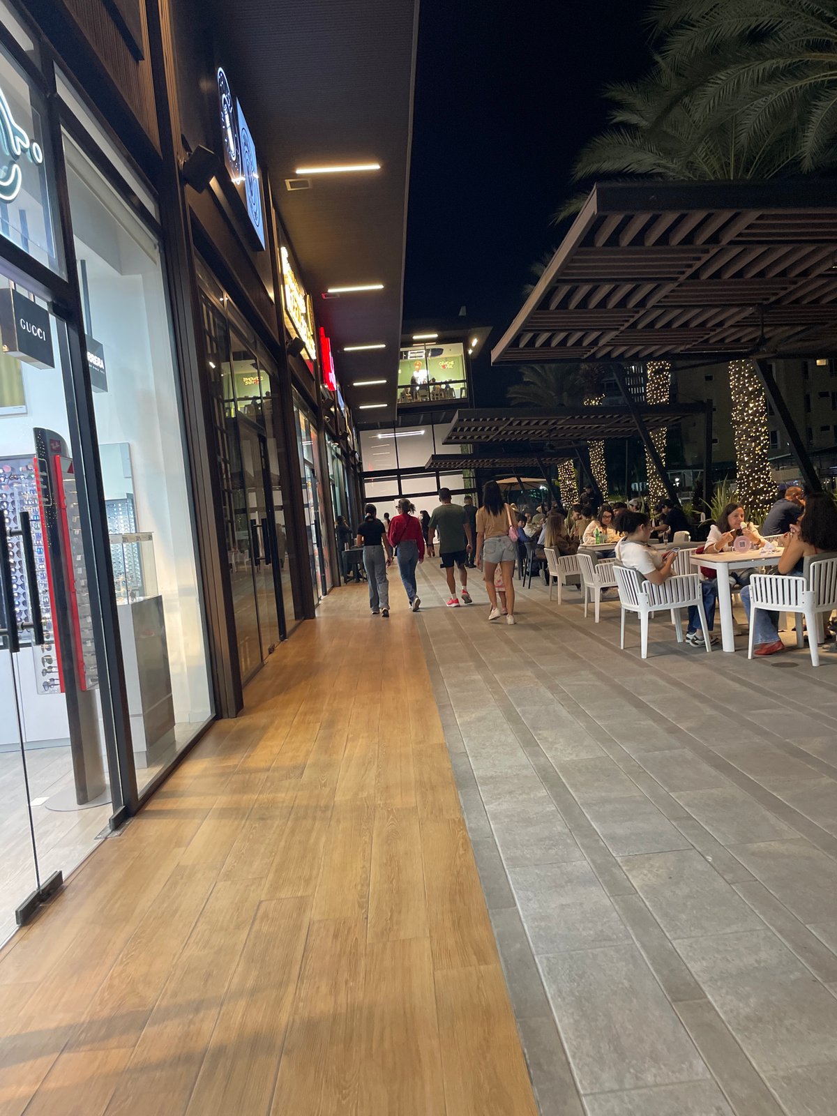 Family visits Pampatar entertainment complex during late night outing