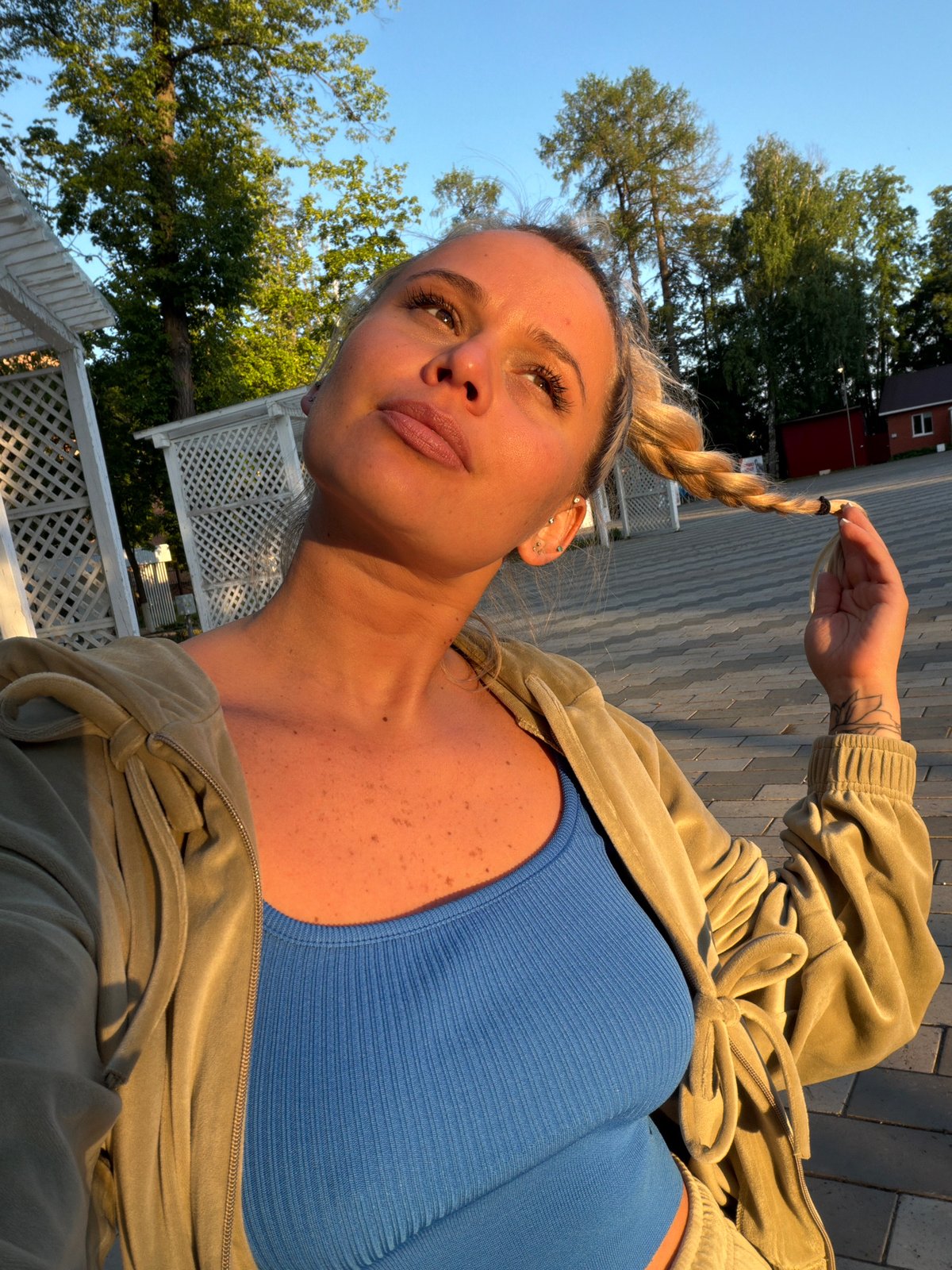 Woman photographed in various poses at Sarapul outdoor location