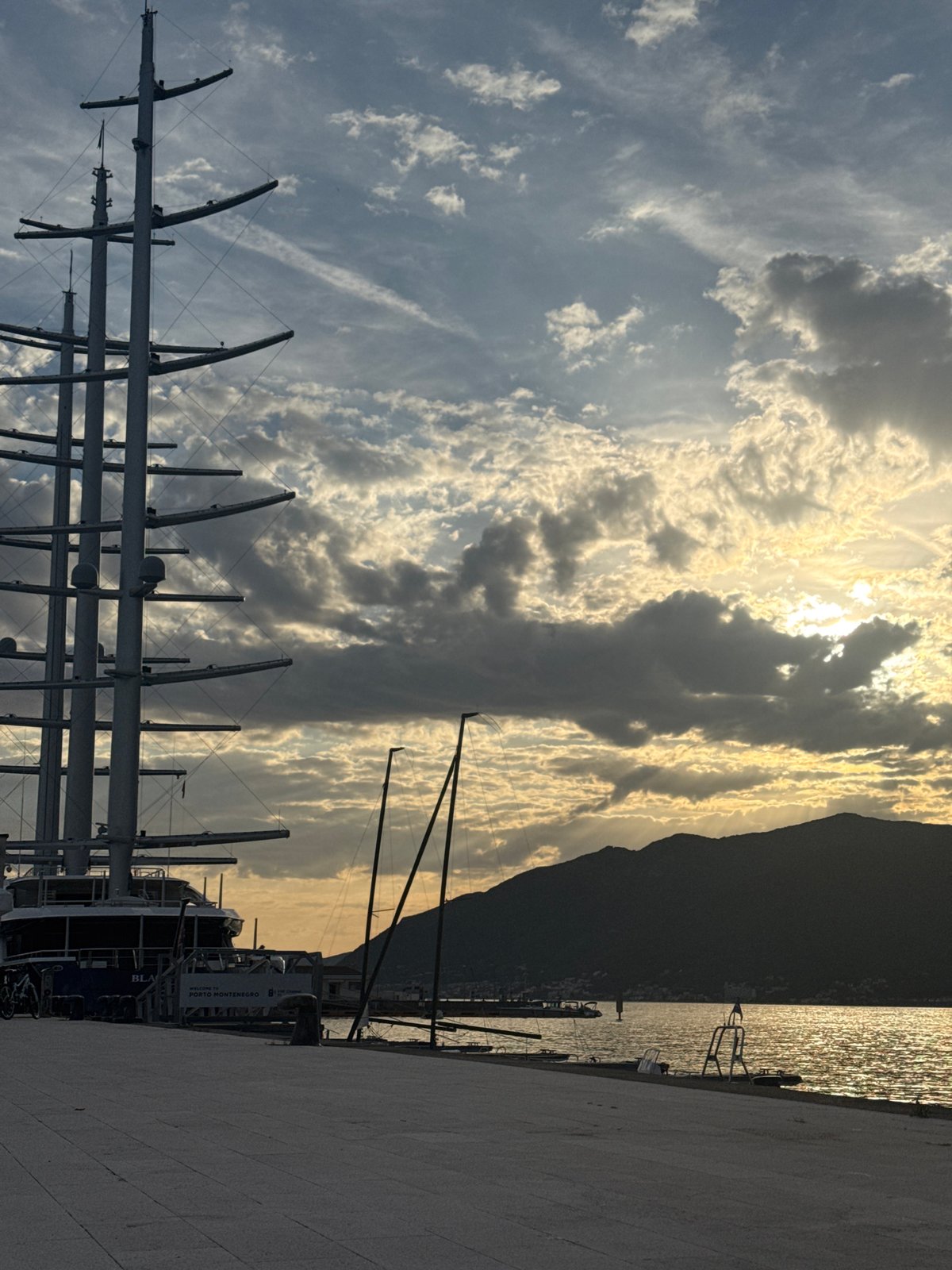 Evening stroll documented at Porto Montenegro marina during golden hour