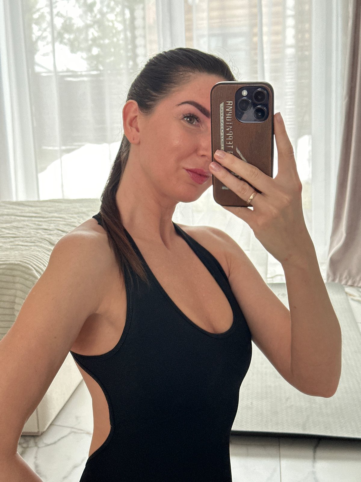 Morning selfie and branded water bottle captured in Chaikovsky
