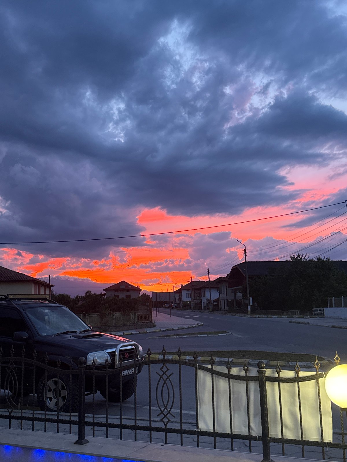 Dramatic sunset illuminates Blatska, Bulgaria amid storm clouds