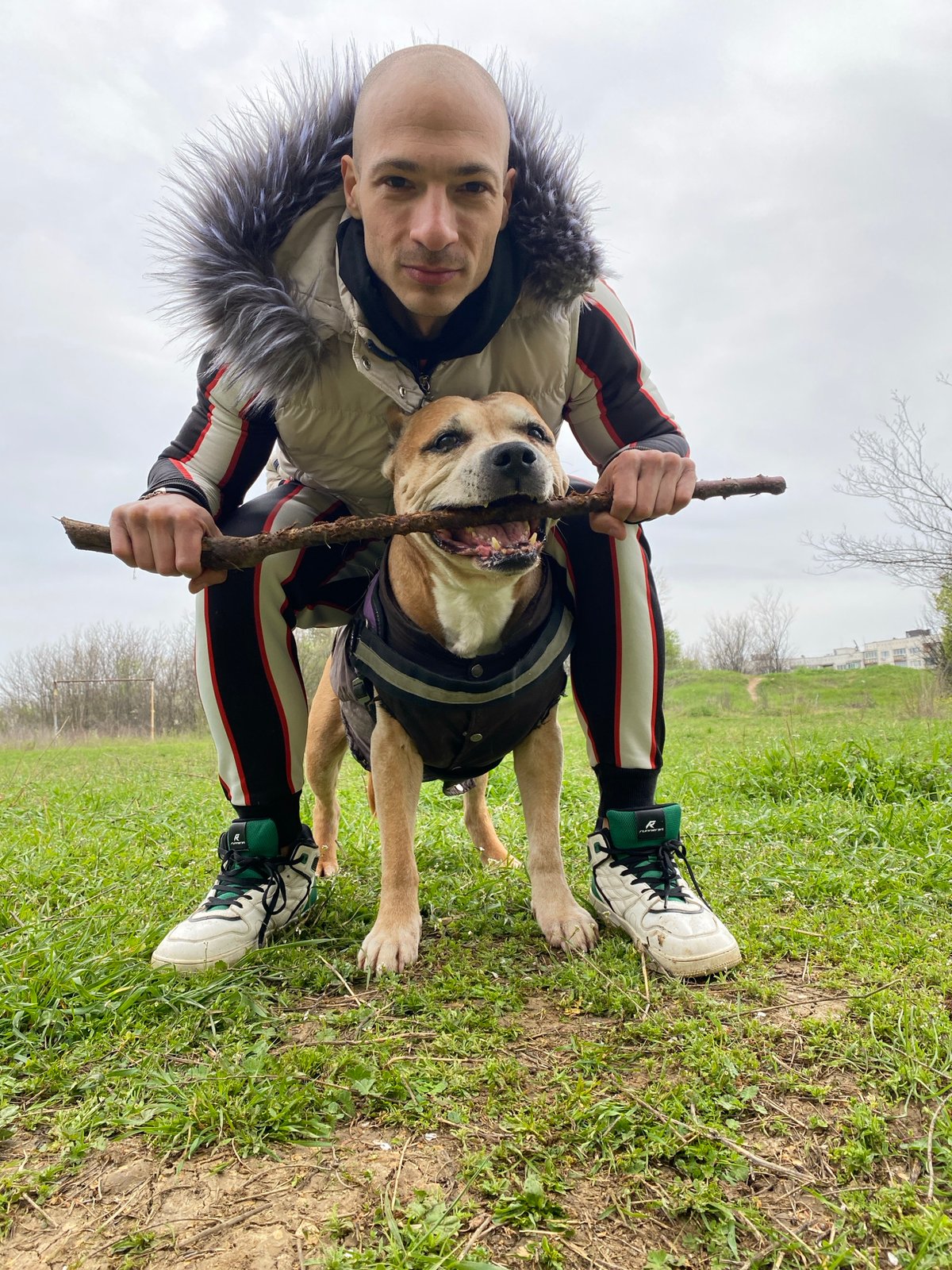 Man plays with dog in Pleven park Saturday morning
